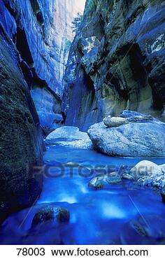 Stock Photo - boulder filled 
river at bottom 
of canyon. fotosearch 
- search stock 
photos, pictures, 
images, and photo 
clipart