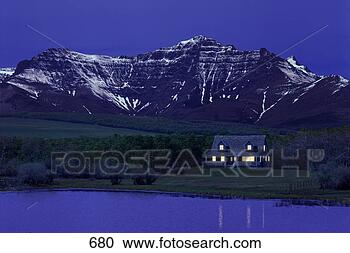 Stock Photography - cabin beside lake 
and mountain. 
fotosearch - search 
stock photos, 
pictures, images, 
and photo clipart