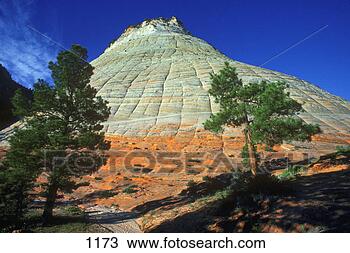 Stock Photo - conical rock formation 
with red base. 
fotosearch - search 
stock photos, 
pictures, images, 
and photo clipart