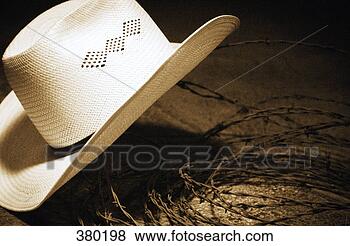 Stock Photo - cowboy hat and 
barbed wire still 
life. fotosearch 
- search stock 
photos, pictures, 
images, and photo 
clipart