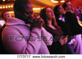 Picture - group worshipping. 
fotosearch - search 
stock photos, 
pictures, images, 
and photo clipart