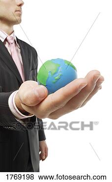 Banco de Imagem - segurando,  mundo, 
 seu,  mão. fotosearch 
- busca de fotos, 
imagens e clipart