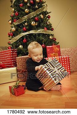 Stock Photo - baby at christmas 
time. fotosearch 
- search stock 
photos, pictures, 
images, and photo 
clipart