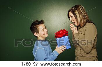  Gift Girl Gift on Picture Of Boy Gives A Gift To Girl 1780197   Search Stock Photography