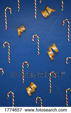 Picture - design of candy 
canes and gift 
ribbon. fotosearch 
- search stock 
photos, pictures, 
images, and photo 
clipart