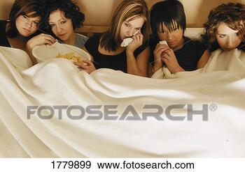 Stock Photograph - group of girls 
watching a sad 
movie. fotosearch 
- search stock 
photos, pictures, 
images, and photo 
clipart