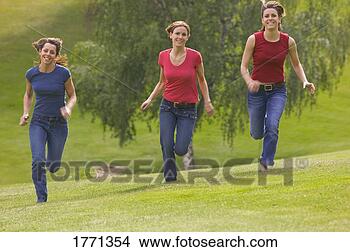 Stock Photo - three teen girls 
running. fotosearch 
- search stock 
photos, pictures, 
images, and photo 
clipart