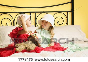 Stock Image - young girls playing 
dress up. fotosearch 
- search stock 
photos, pictures, 
images, and photo 
clipart