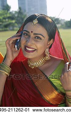 Stock Photography - india,  mumbai, 
 maharastra,  
woman dressed 
in sari,  traditional. 
fotosearch - search 
stock photos, 
pictures, images, 
and photo clipart