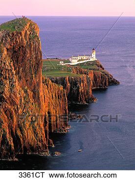 Stock Photo - scotland, isle 
of skye, lighthouse 
on cliff overlooking 
ocean. fotosearch 
- search stock 
photos, pictures, 
images, and photo 
clipart