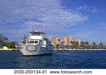 Stock Photography - bahamas, yacht 
by beach and atlantis 
resort in background. 
fotosearch - search 
stock photos, 
pictures, images, 
and photo clipart