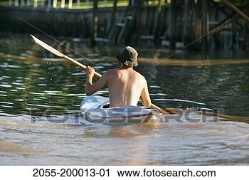 Stock Photography - argentina, buenos 
aires, man kayaking. 
fotosearch - search 
stock photos, 
pictures, images, 
and photo clipart