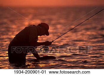 Stock Photography - man fly fishing. 
fotosearch - search 
stock photos, 
pictures, images, 
and photo clipart