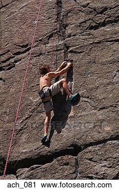 Stock Photography - man rock climbing. 
fotosearch - search 
stock photos, 
pictures, images, 
and photo clipart