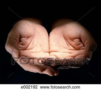 Stock Photo - hands in cupping 
position on black 
background. fotosearch 
- search stock 
photos, pictures, 
images, and photo 
clipart