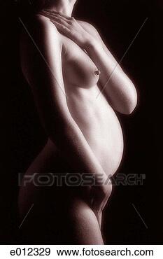 Stock Photograph - nude pregnant 
woman with arm 
over torso. fotosearch 
- search stock 
photos, pictures, 
images, and photo 
clipart