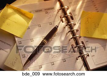 Stock Photograph - appointment book 
with adhesive 
notes stuck to 
pages. fotosearch 
- search stock 
photos, pictures, 
images, and photo 
clipart