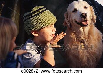 Stock Photo - boy sitting next 
to dog, gesturing. 
fotosearch - search 
stock photos, 
pictures, images, 
and photo clipart