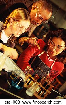 Stock Photo - teacher helping 
two girls in science 
lab. fotosearch 
- search stock 
photos, pictures, 
images, and photo 
clipart