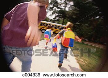 Stock Photo - children running 
toward school 
bus. fotosearch 
- search stock 
photos, pictures, 
images, and photo 
clipart