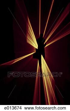 Stock Illustration - silhouette of 
person walking 
through beams 
of light. fotosearch 
- search clipart, 
illustration, 
drawings and vector 
eps graphics images