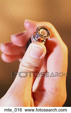 Stock Photo - hand holding bnc 
connector. fotosearch 
- search stock 
photos, pictures, 
images, and photo 
clipart