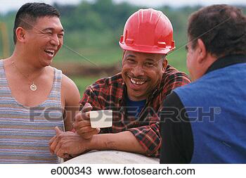 Stock Photo - group of smiling 
men; one man wearing 
hard hat. fotosearch 
- search stock 
photos, pictures, 
images, and photo 
clipart