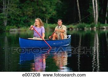 Stock Photo - canoeists paddling 
down river. fotosearch 
- search stock 
photos, pictures, 
images, and photo 
clipart