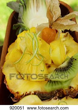 Stock Photography - exotic fruit salad 
with pineapple 
& physalis in 
wooden bowl. fotosearch 
- search stock 
photos, pictures, 
images, and photo 
clipart