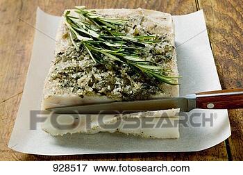 Picture - bacon fat from 
tuscany with rosemary, 
a slice being 
cut. fotosearch 
- search stock 
photos, pictures, 
images, and photo 
clipart