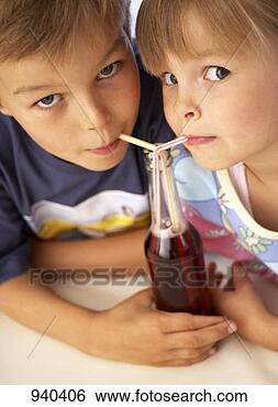 Stock Photo - children drinking 
fizzy drink through 
straws. fotosearch 
- search stock 
photos, pictures, 
images, and photo 
clipart