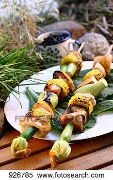 Stock Image - grilled turkey 
kebabs with sweetcorn 
& vegetables in 
open air. fotosearch 
- search stock 
photos, pictures, 
images, and photo 
clipart