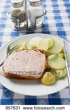 Stock Photography - leberk se (type 
of meatloaf) with 
mustard & potato 
salad on plate. 
fotosearch - search 
stock photos, 
pictures, images, 
and photo clipart