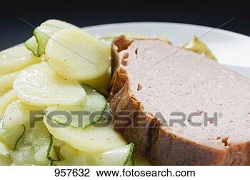 Stock Photo - leberk se (type 
of meatloaf) with 
potato salad (close-up). 
fotosearch - search 
stock photos, 
pictures, images, 
and photo clipart