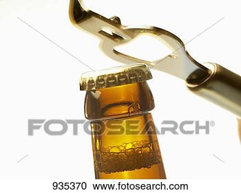Stock Photography - beer bottle neck 
with crown cap 
and bottle opener. 
fotosearch - search 
stock photos, 
pictures, images, 
and photo clipart