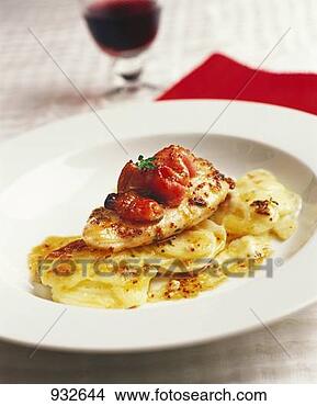 Stock Photo - chicken breast 
with tomatoes 
and potato gratin. 
fotosearch - search 
stock photos, 
pictures, images, 
and photo clipart