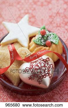 Stock Photography - christmas biscuits 
and christmas 
tree ornaments 
on plate. fotosearch 
- search stock 
photos, pictures, 
images, and photo 
clipart