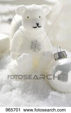 Stock Photography - christmas decoration: 
polar bear & christmas 
baubles in snow. 
fotosearch - search 
stock photos, 
pictures, images, 
and photo clipart