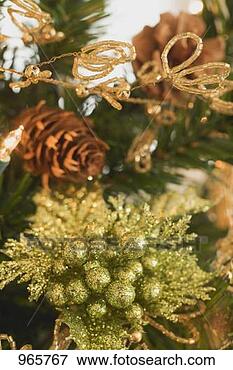 Picture - christmas tree 
ornaments on artificial 
christmas tree. 
fotosearch - search 
stock photos, 
pictures, images, 
and photo clipart