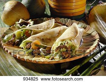 Stock Image - crêpes filled 
with beef, beans 
and bamboo (philippines). 
fotosearch - search 
stock photos, 
pictures, images, 
and photo clipart