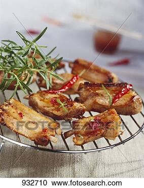 Stock Photography - grilled ribs with 
rosemary and chilli. 
fotosearch - search 
stock photos, 
pictures, images, 
and photo clipart