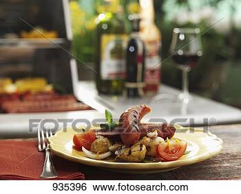 Stock Photo - grilled sausages 
with potatoes. 
fotosearch - search 
stock photos, 
pictures, images, 
and photo clipart