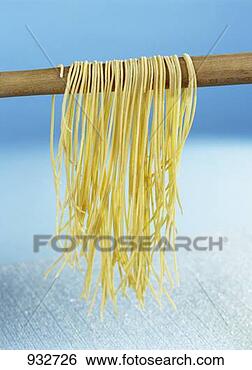 Stock Photo - home-made pasta 
hanging up to 
dry. fotosearch 
- search stock 
photos, pictures, 
images, and photo 
clipart