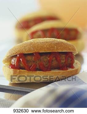 Stock Photography - hotdog with ketchup. 
fotosearch - search 
stock photos, 
pictures, images, 
and photo clipart