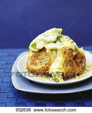 Stock Photo - jacket potato 
with cheese and 
leeks. fotosearch 
- search stock 
photos, pictures, 
images, and photo 
clipart