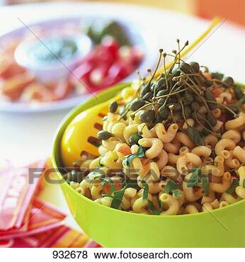 Stock Photo - pasta with capers 
and basil. fotosearch 
- search stock 
photos, pictures, 
images, and photo 
clipart