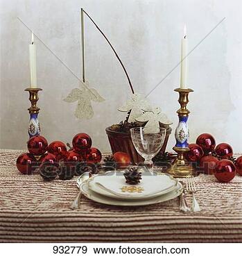 Stock Photograph - red baubles and 
felt angels on 
christmas table. 
fotosearch - search 
stock photos, 
pictures, images, 
and photo clipart