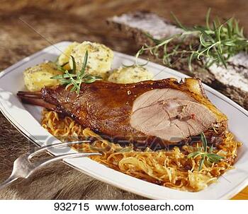 Stock Image - roast leg of wild 
boar with sauerkraut 
and dumplings. 
fotosearch - search 
stock photos, 
pictures, images, 
and photo clipart