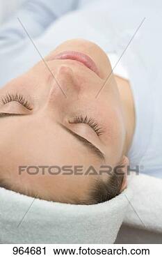 Stock Photography - woman, lying down, 
before beauty 
treatment. fotosearch 
- search stock 
photos, pictures, 
images, and photo 
clipart
