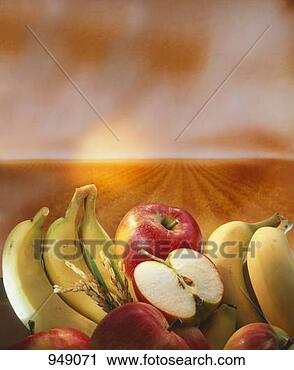 Stock Photography - bananas, apples 
and cereals against 
a cornfield. fotosearch 
- search stock 
photos, pictures, 
images, and photo 
clipart